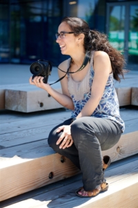 woman holding a camera